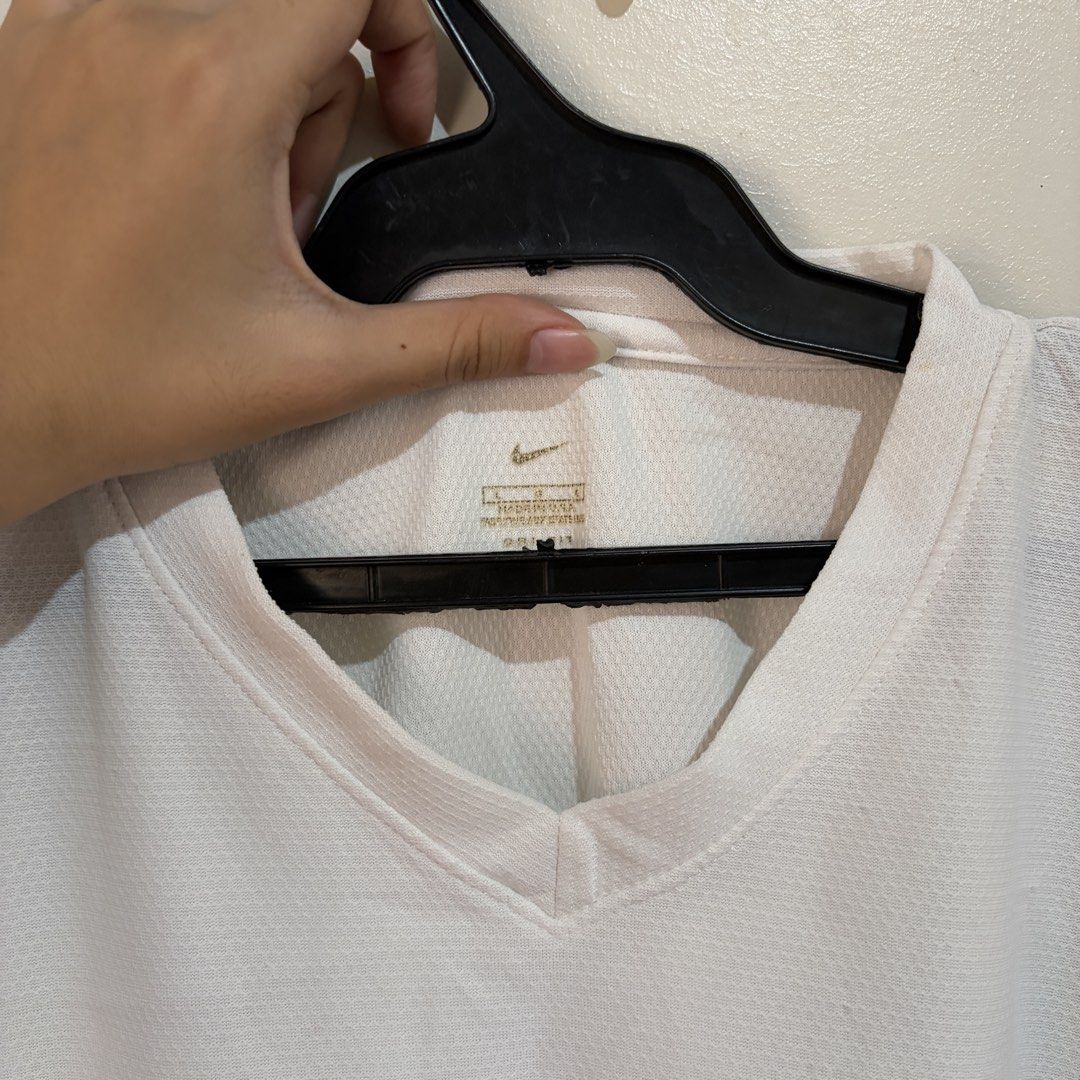 White Dri fit Nike shirt (Category: Shirts) located in Manila. Submitted by serra_shop (Listing ID 1467642454, Image 2). Description: Original Nike 100% Embroidered Nike check In good condition S-M Boxy Crop Tee 10/10 Location : Pampanga Courier : J&T.