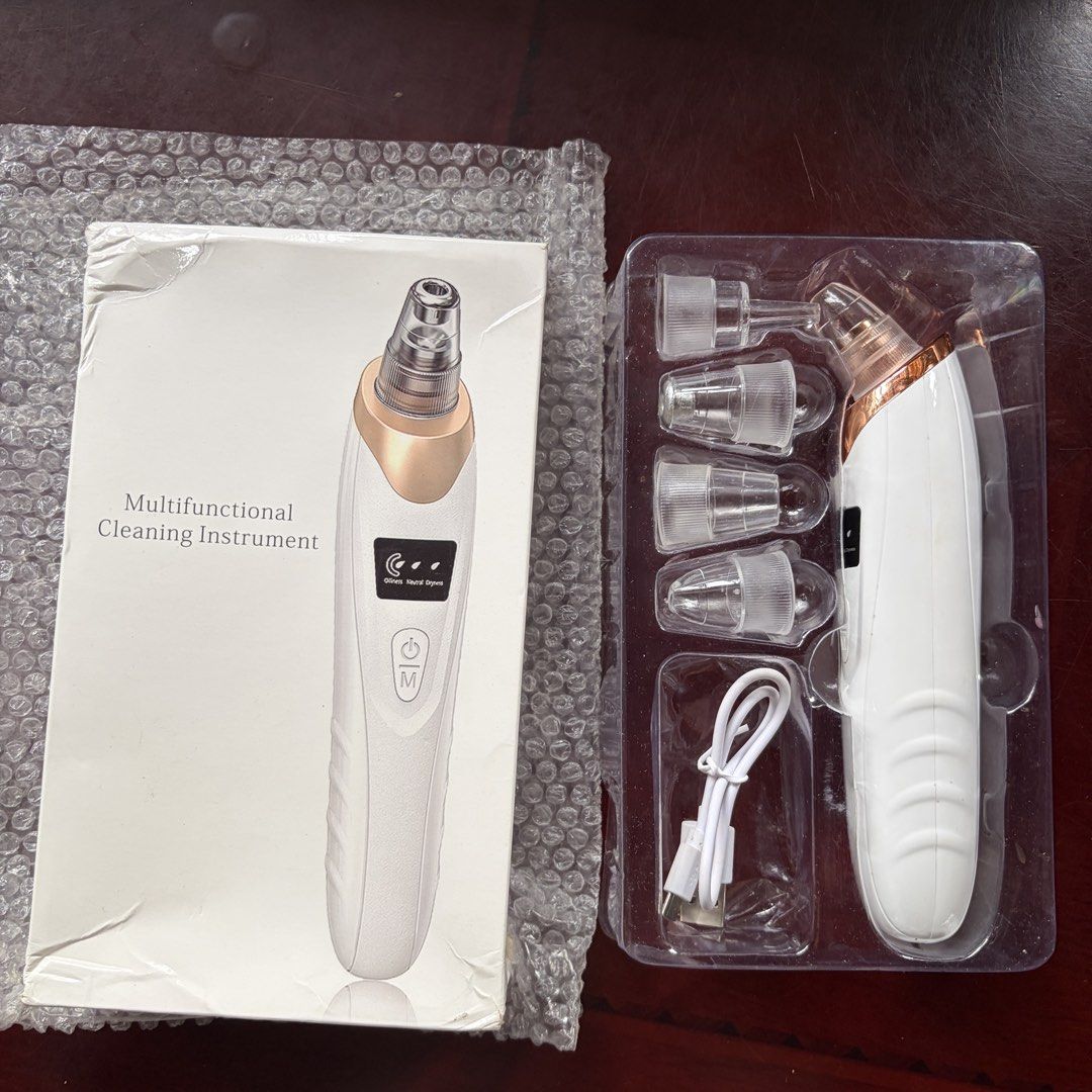 White heads vacuum remover (Category: Face Care) located in Manila. Submitted by serra_shop (Listing ID 1467634271, Image 3). Description: White heads vacuum remover Condition: Once used Rfs: filmed this product for affiliate promotion only Has 3 modes Dm for the proof of the product working quality Has 5 nozzles Box included Charger cord included Courier: J&T Location: Pampanga.