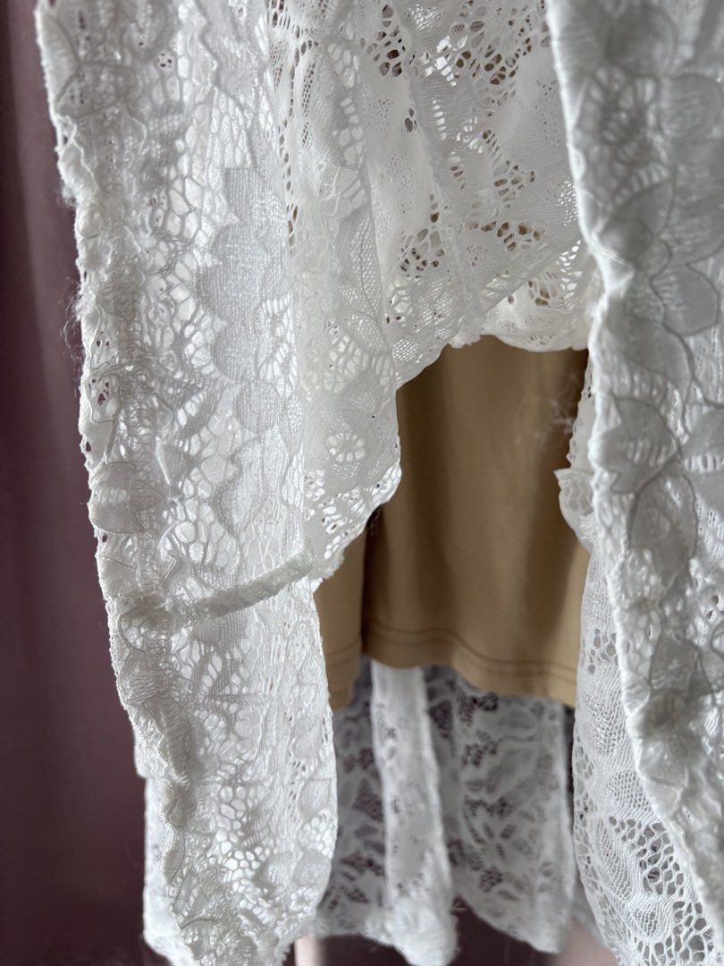 White lace long dress with nude lining (Category: Dresses) located in Manila. Submitted by hannieu (Listing ID 1467777928, Image 3). Description: White floral lace midi dress over a nude slip lining. Sleeveless design with a high mock neckline and a keyhole cutout detail at the back. Midi length with a fitted bodice and flared skirt. Great piece for weddings, dates, or brunch outings..