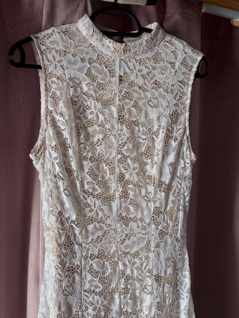 White lace long dress with nude lining (Category: Dresses) located in Manila. Submitted by hannieu (Listing ID 1467777928, Image 2). Description: White floral lace midi dress over a nude slip lining. Sleeveless design with a high mock neckline and a keyhole cutout detail at the back. Midi length with a fitted bodice and flared skirt. Great piece for weddings, dates, or brunch outings..