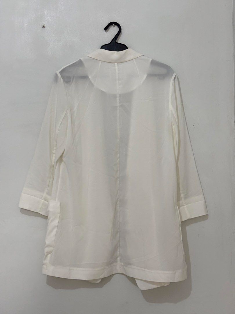 White Long Coat (Category: Longsleeves) located in Quezon City. Submitted by chrissie__ (Listing ID 1467690700, Image 2). Description: ▪️ See through ▪️Used once..