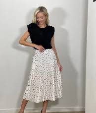 white polka dot pleated midi skirt (Category: Skirts) located in Cordova. Submitted by thedecluterrer (Listing ID 1467606789, Image 1). Description: .