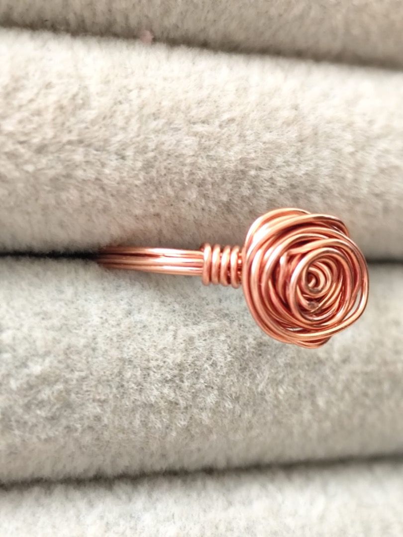 Wire wrapped Small Rose Ring (Nontarnish Rose Gold) Size 6 (Category: Rings) located in Mandaluyong City. Submitted by allaboutgemsandco (Listing ID 1467740318, Image 3). Description: Wire wrapped Small Rose Ring (Nontarnish Rose Gold) Size 6 Facet size: 10mmx9mm Ring Size: 6 Price: Php 80 add shipping fee for less than Php 1000 ✨ Your Daily Dose of Handcrafted Romance! 🌹✨ Say hello to our stunning Wire Wrapped Small Rose Ring! Made with premium