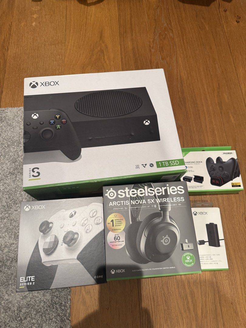 Xbox Series S 1TB Bundle with Controller and Headset (Category: Xbox) located in Quezon City. Submitted by tyron.vitangcol (Listing ID 1467604271, Image 1). Description: - Console: Xbox Series S 1TB in Black (with Box and original cable + controller) - Headset: SteelSeries Arctis Nova 5X Wireless - Controller: Xbox Elite Series 2 Core (White) - Accessories: Dobe charging dock and official Xbox rechargeable battery kit - Condition: Complete set as