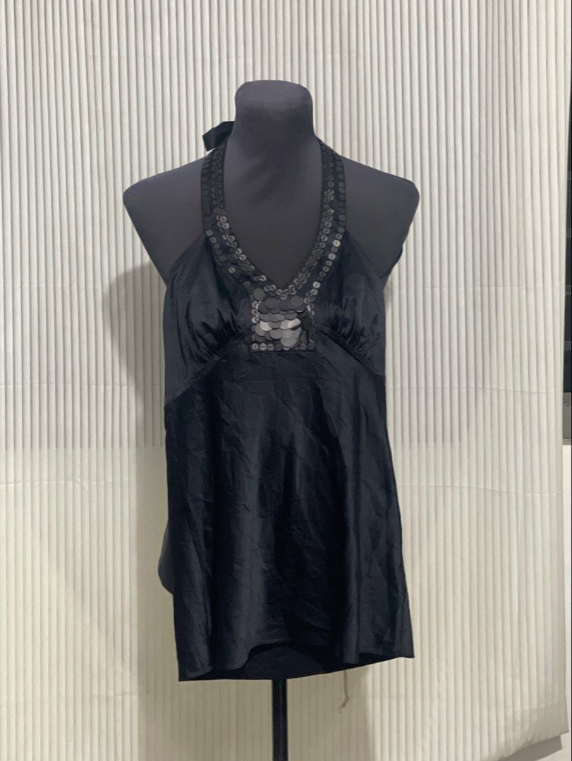 Y2K Black Silk Halter top (Category: Others Tops) located in Tuguegarao City. Submitted by ziggerryy (Listing ID 1467785684, Image 1). Description: Minimal bended design. No holes XS-S ‼️LAST PRICE POSTED‼️.