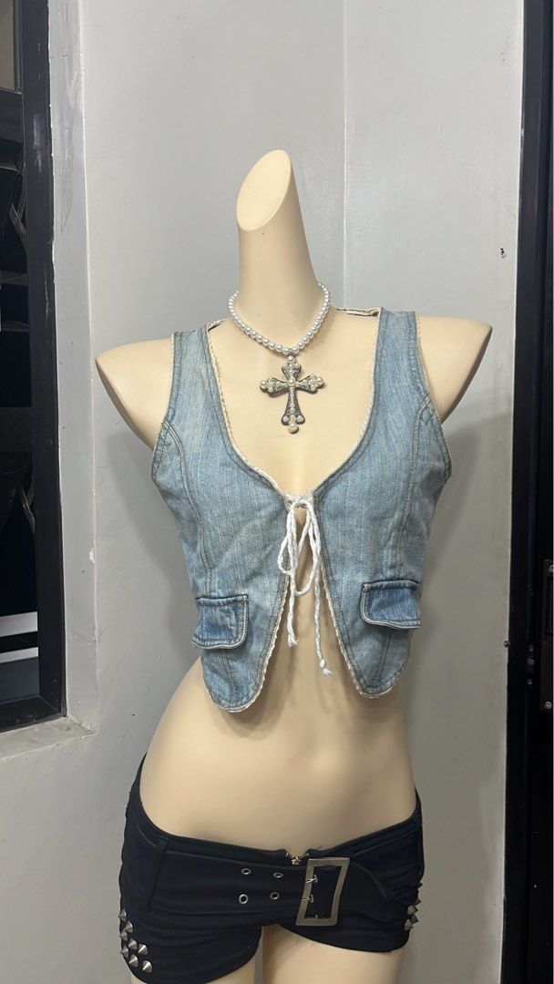 Y2k denim vest with ribbon back design (Category: Others Tops) located in Caloocan City. Submitted by onlyfromthepast (Listing ID 1467719765, Image 1). Description: 9/10 condition Small ✅My bio before purchasing tia💕 ✅ All items are fresh from bales, Pls expect dirt,dust or stains.