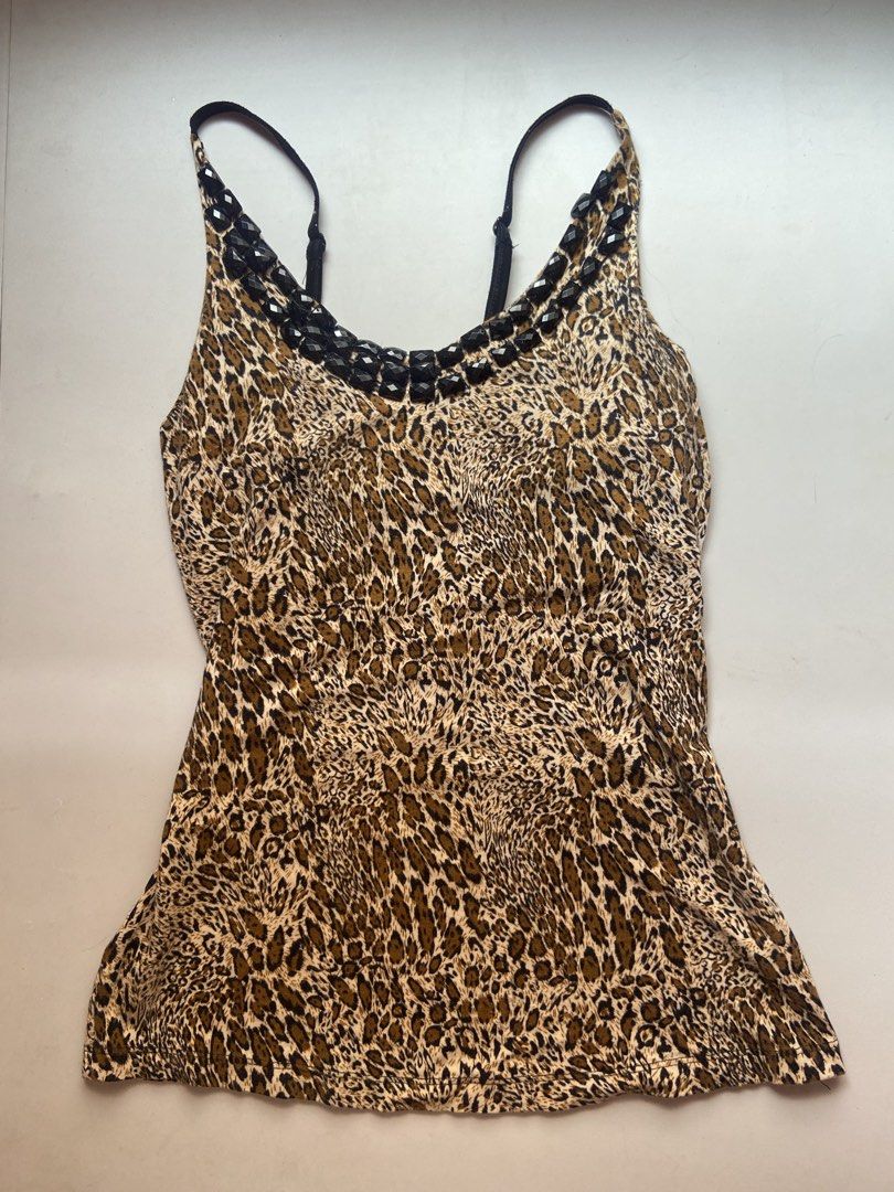 y2k leopard print beaded strap tank top (Category: Sleeveless) located in Manila. Submitted by atashaelline (Listing ID 1467724295, Image 1). Description: - with adjustable straps - has double lining sa chest area - no issue! complete beads - material: cotton - fit: s - m (very stretchy) .