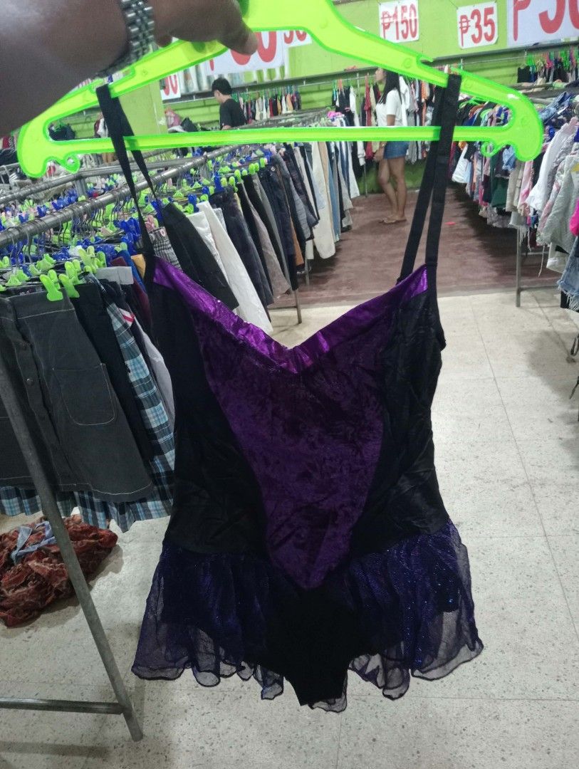 Y2k tops (Category: Dresses) located in Tukuran. Submitted by coyythrift (Listing ID 1467759089, Image 2). Description: - Color: Black and purple velvet - Design: Spaghetti straps with metallic purple sweetheart neckline trim - Skirt: Sheer ruffled overlay with sparkly glitter threads (attached bottoms underneath) - Fit: Stretchy, comfortable fabric - Ideal for: Dance practice, gymnastics, or dress-up parties.