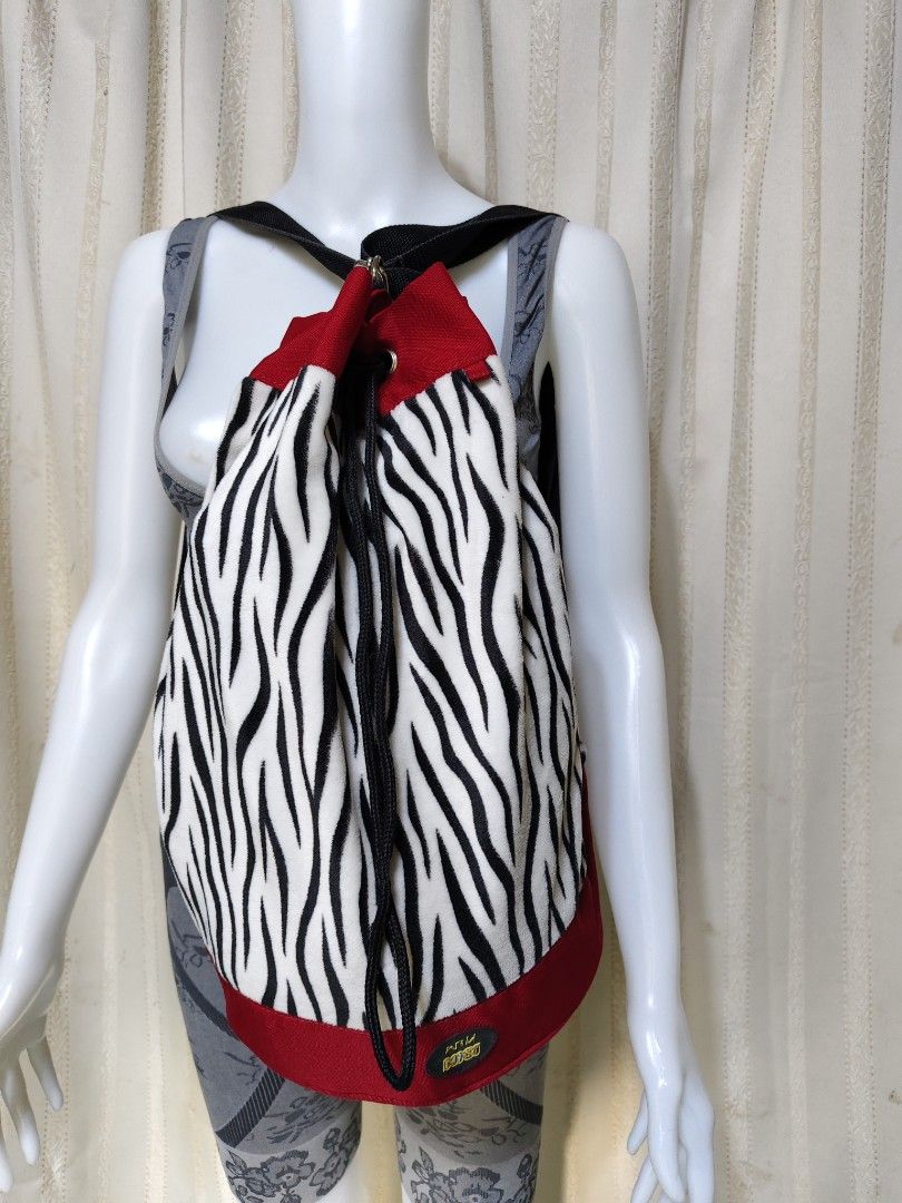 Y2K Vibes! NICI Plush Zebra Print Drawstring Backpack 🎒 (Category: Luxury Bags & Wallets) located in Baguio. Submitted by pisces_beattidue23 (Listing ID 1467628105, Image 2). Description: Y2K Vibes! NICI Plush Zebra Print Drawstring Backpack 🎒.
