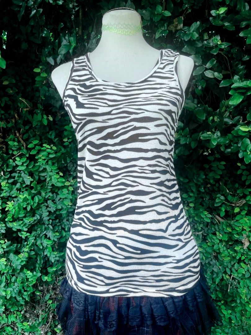 Y2k Zebra Print Tank Top (Category: Sleeveless) located in Los Banos. Submitted by nicot_nit (Listing ID 1467777963, Image 2). Description: mine ₱770 (OR DROP YOUR BEST OFFER)❗ +sf 24x15 xs-small 10/10 no issues click or slides each photos for any flaws n other details, dm me or comment to purchase n other details📩.
