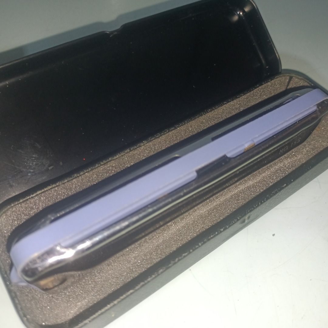 Yamaha No.155 Harmonica in Hard Case (Category: Musical Instruments) located in Munoz. Submitted by larryc1212 (Listing ID 1467680577, Image 3). Description: - Model: Yamaha No.155 Harmonica - Includes original black protective case with custom fitted foam interior - Features chrome-plated cover plates with engraved Yamaha logo and a blue plastic comb - Condition: Minor scuffs on the metal casing from previous handling, fully functional and ready