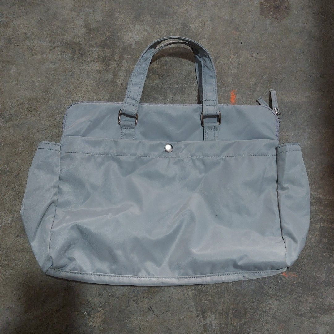 Y'SACCS MULTIPOCKET NYLON TRAVEL TOTE BAG (Category: Accessory Holder, Box & Organizers) located in Tuguegarao City. Submitted by 3500.finds (Listing ID 1467639858, Image 2). Description: Multiple comparments / multipocket 14 x 11 x 5.5 Excellent condition Color rate 9.5/10 No issue.
