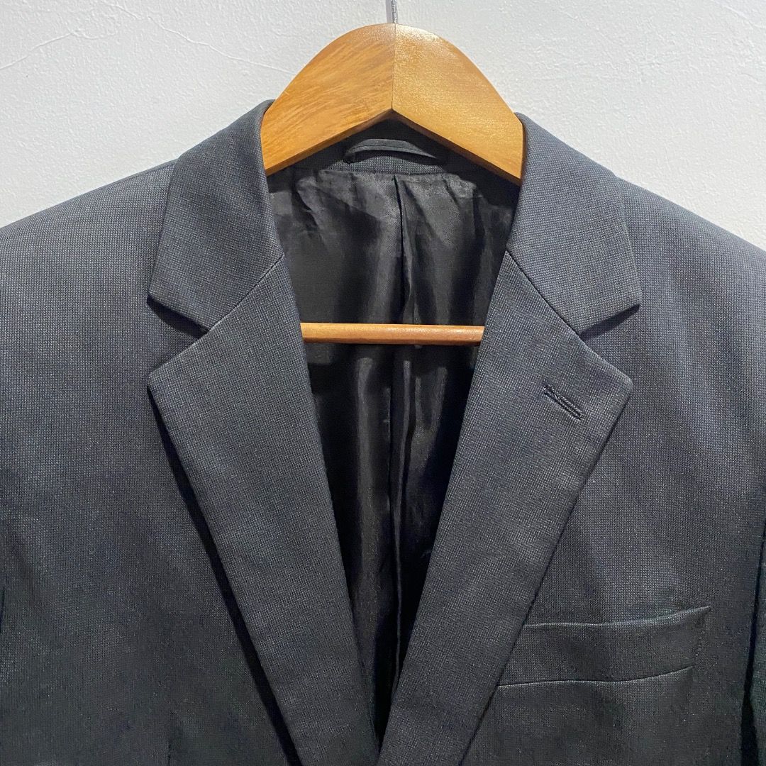 Z Zegna Single-breasted Wool Jacket 48 (Category: Coats, Jackets and Outerwear) located in Antipolo. Submitted by bentakahitanoano (Listing ID 1467727987, Image 3). Description: This Z Zegna garment is a classic grey single-breasted jacket featuring a standard two-button closure, notched lapels, dual flap pockets at the hips, and a welt pocket at the chest. Still in good condition Size 48 Pit to pit 19.5 Length 28.5.