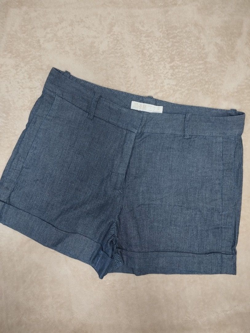ZARA Basic Denim Couture Blue Shorts Size 32 (Category: Shorts) located in Dagupan City. Submitted by nartleb_naan (Listing ID 1467660309, Image 1). Description: - Brand: ZARA Basic - Item: Denim Couture Shorts - Color: Blue - Size: Medium (US M, EUR M, Size 30) - Design: Folded hem, button and zip closure, belt loops, and back pockets - Origin: Made in Morocco - Condition/Vibe: Great casual staple piece for everyday wear.