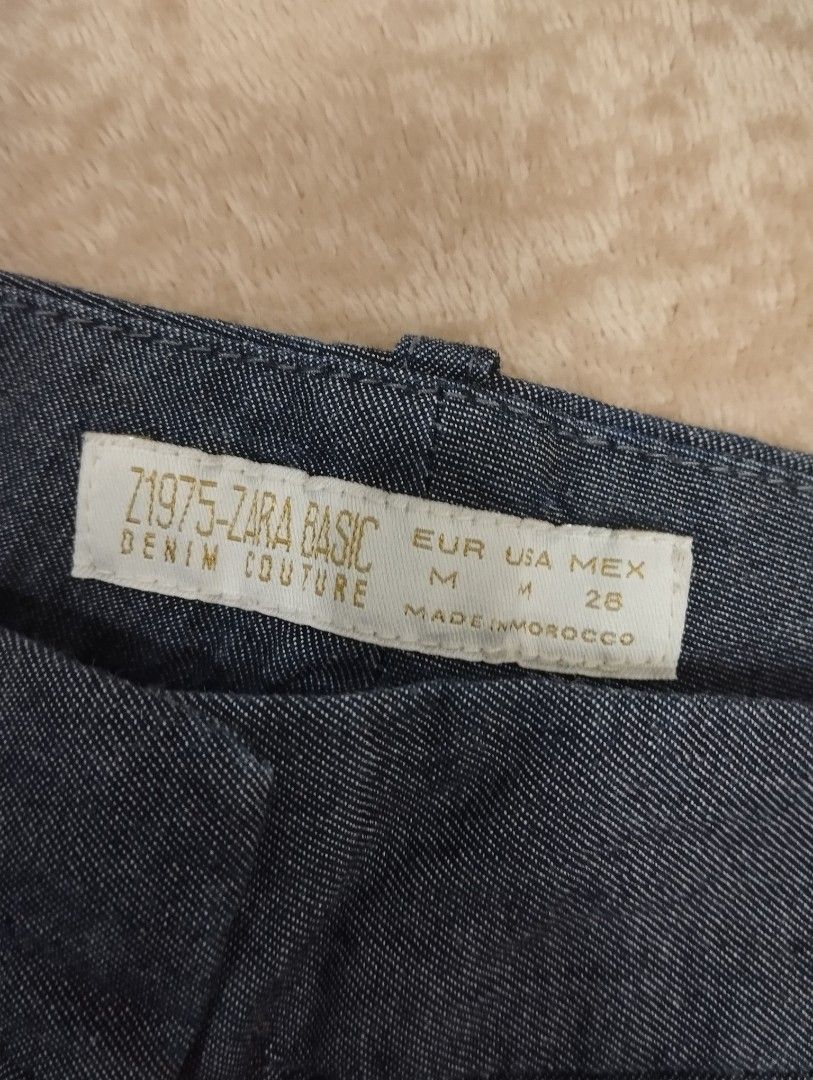 ZARA Basic Denim Couture Blue Shorts Size 32 (Category: Shorts) located in Dagupan City. Submitted by nartleb_naan (Listing ID 1467660309, Image 3). Description: - Brand: ZARA Basic - Item: Denim Couture Shorts - Color: Blue - Size: Medium (US M, EUR M, Size 30) - Design: Folded hem, button and zip closure, belt loops, and back pockets - Origin: Made in Morocco - Condition/Vibe: Great casual staple piece for everyday wear.