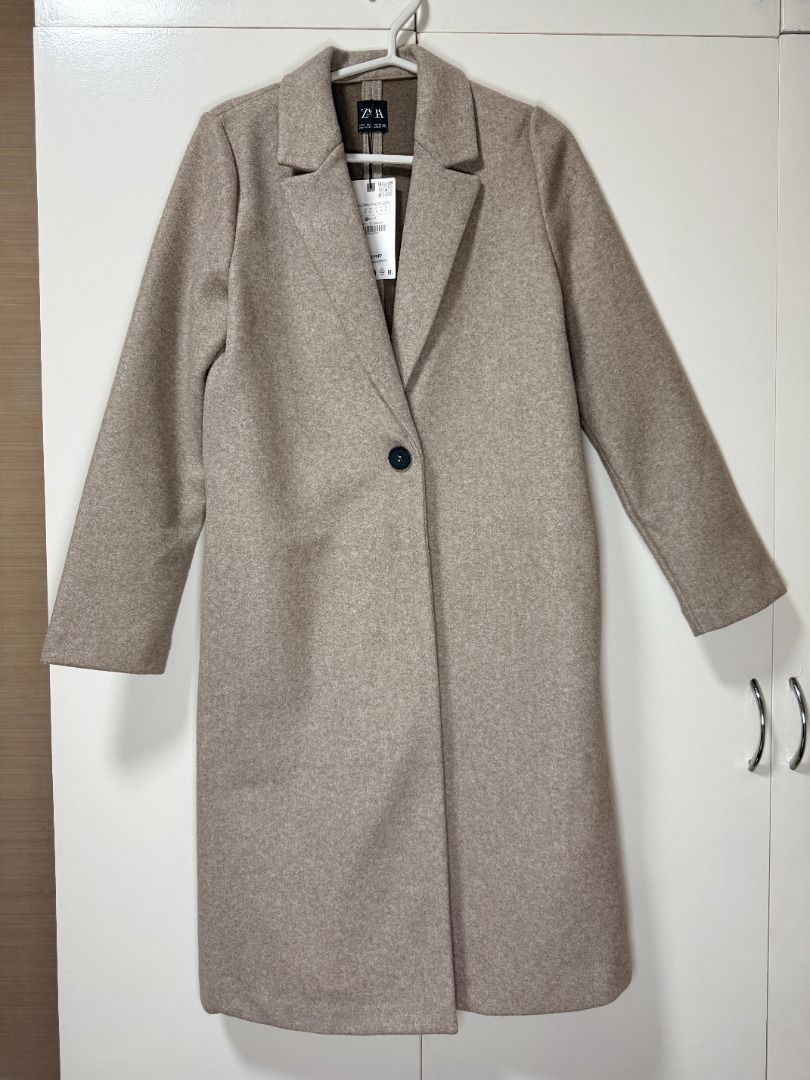 Zara Basic Soft Coat (Category: Coats, Jackets and Outerwear) located in Quezon City. Submitted by laragaelle (Listing ID 1467735907, Image 2). Description: Name: Zara Basic Soft Coat Colour: Beige Marl Design: Notched lapel collar, long sleeves, straight hem and front button fastening. Size on Tag: S / EUR S / USA S / MEX 26 Purchased for: P2,595 RFS: Decluttering, never used.