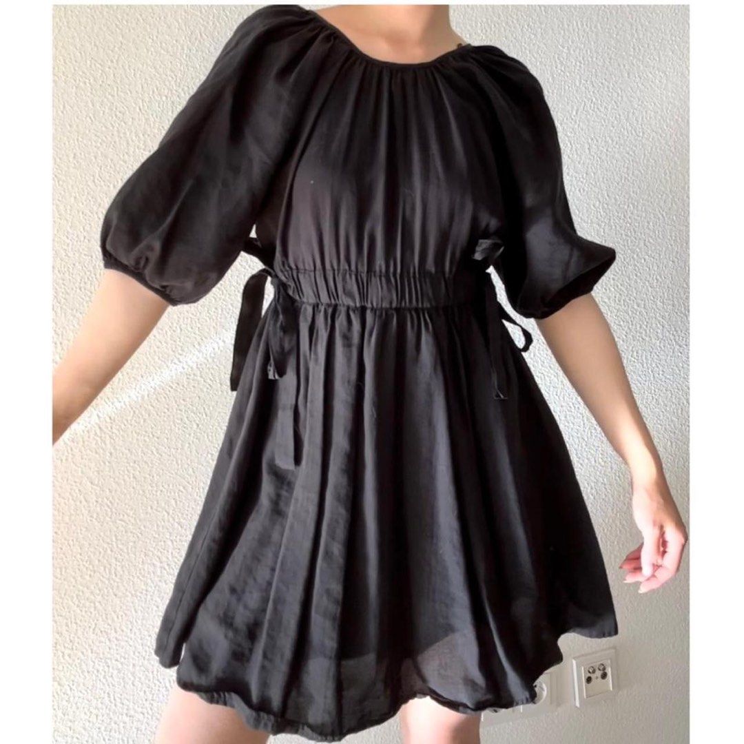 Zara Black Midi Dress Size S (Category: Dresses) located in Mabalacat. Submitted by fashionclothesph (Listing ID 1467737840, Image 2). Description: - Brand: Zara - Size: S (Made in Turkey) - Color: Classic Black - Material: Lightweight cotton with full lining - Details: Crew neckline, 3/4 voluminous sleeves with elastic cuffs - Fit: Elastic waist with adjustable side tie ribbons - Closure: Keyhole button closure at the back neck - Style: Versatil