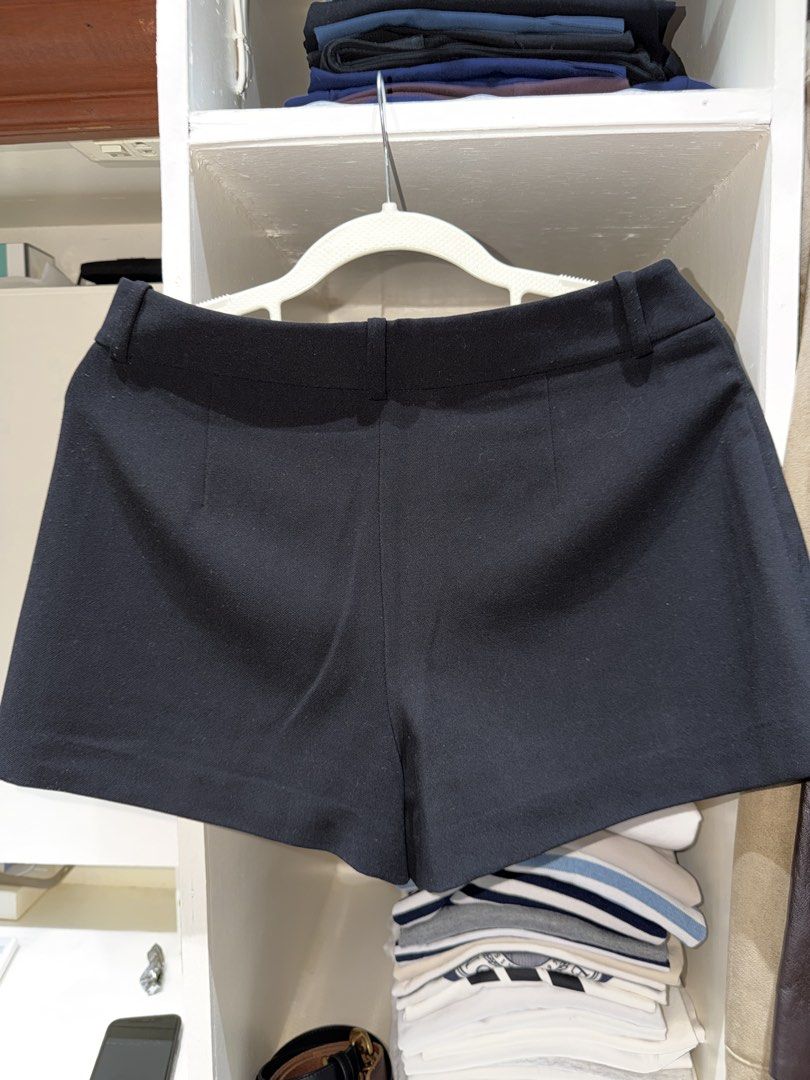 Zara Black Pleated Skort Size S (Category: Skirts) located in Batangas. Submitted by luxuryinmyclowset (Listing ID 1467731837, Image 3). Description: - Brand: Zara - Color: Black - Size: S (fits true to size) - Details: Structured waistband, belt loops, hidden side zipper closure - Origin: Made in Vietnam - Condition: Clean overall, great pre-loved condition.