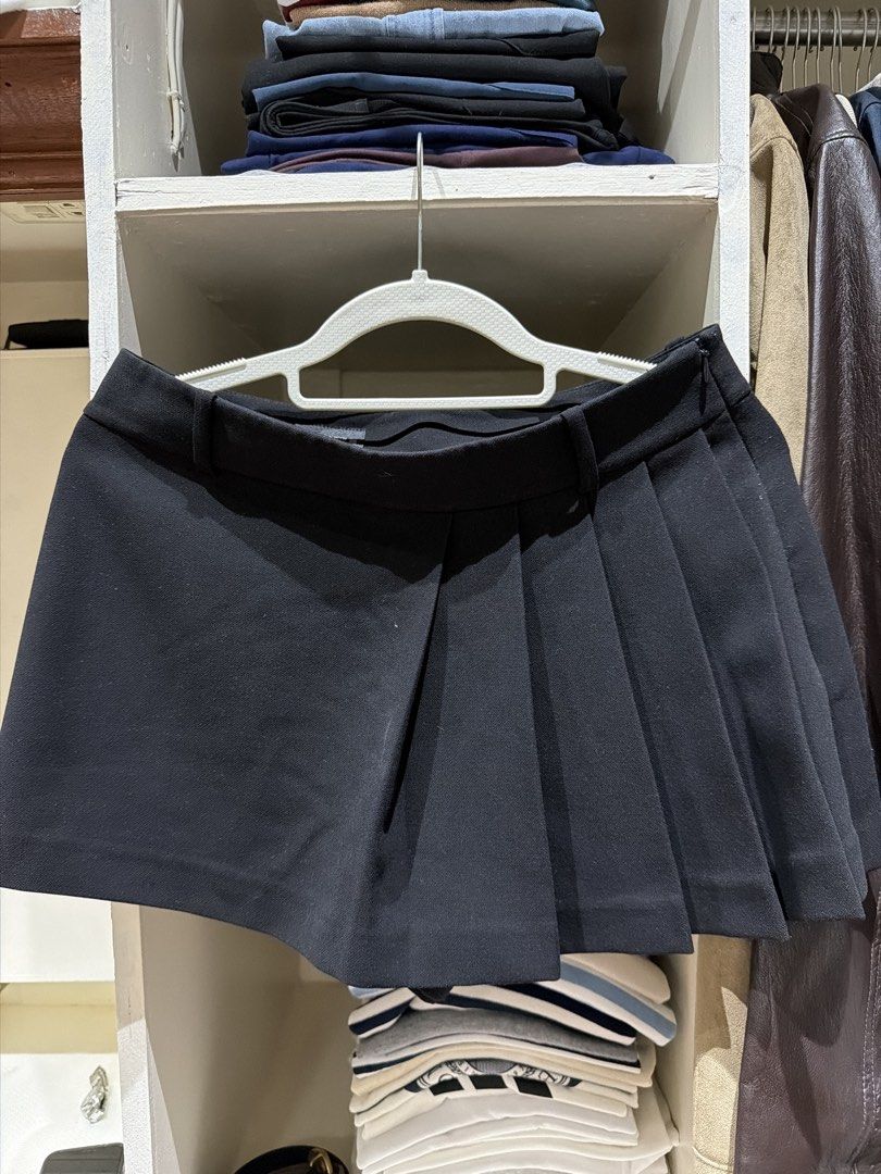 Zara Black Pleated Skort Size S (Category: Skirts) located in Batangas. Submitted by luxuryinmyclowset (Listing ID 1467731837, Image 1). Description: - Brand: Zara - Color: Black - Size: S (fits true to size) - Details: Structured waistband, belt loops, hidden side zipper closure - Origin: Made in Vietnam - Condition: Clean overall, great pre-loved condition.