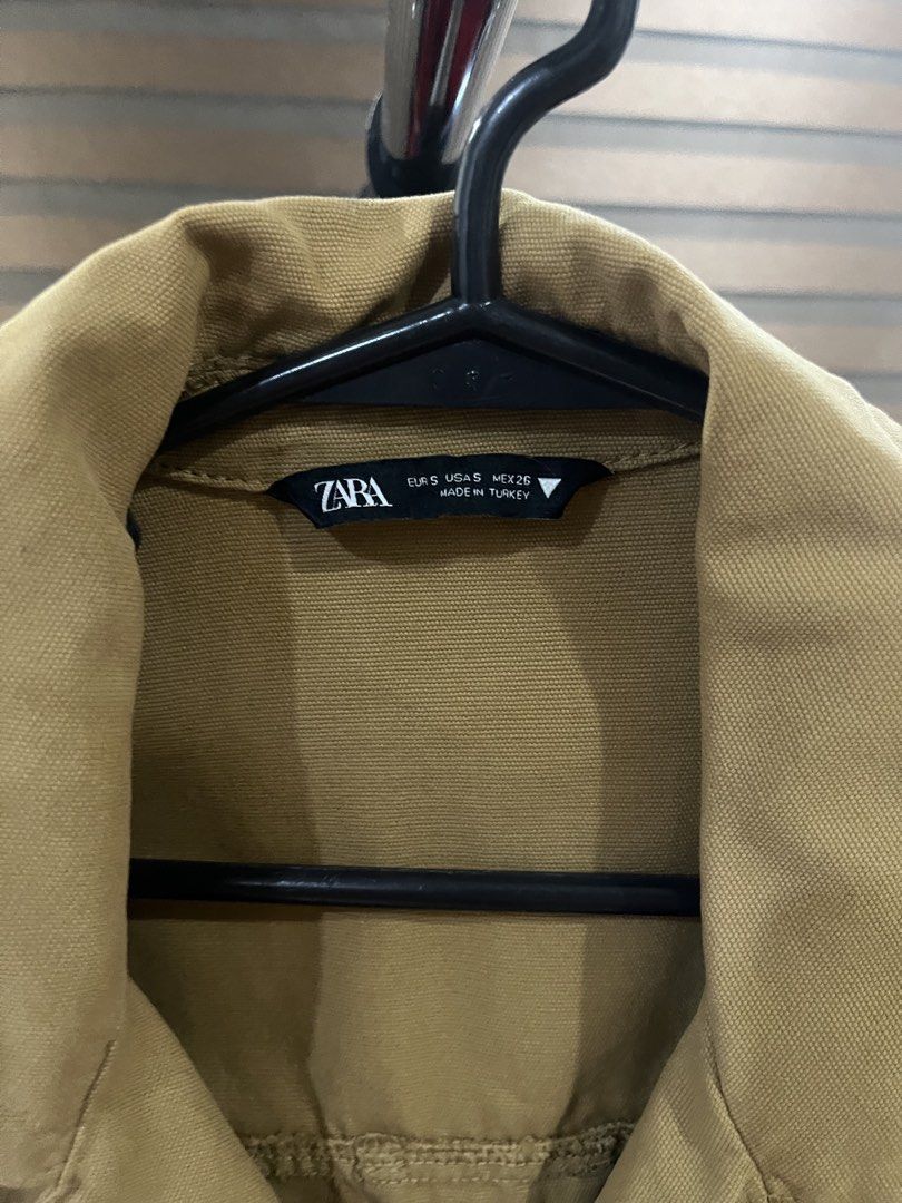 Zara Brown Cropped Utility Jacket Size S (Category: Coats, Jackets and Outerwear) located in Makati City. Submitted by grizzlybear95 (Listing ID 1467728812, Image 2). Description: - Brand: Zara - Size: Small (Made in Turkey) - Color: Neutral brown - Fit: Cropped - Details: Shoulder epaulets, large front pockets, tortoiseshell-style buttons, structured collar, and button cuffs - Condition: Great layering piece for cooler days.