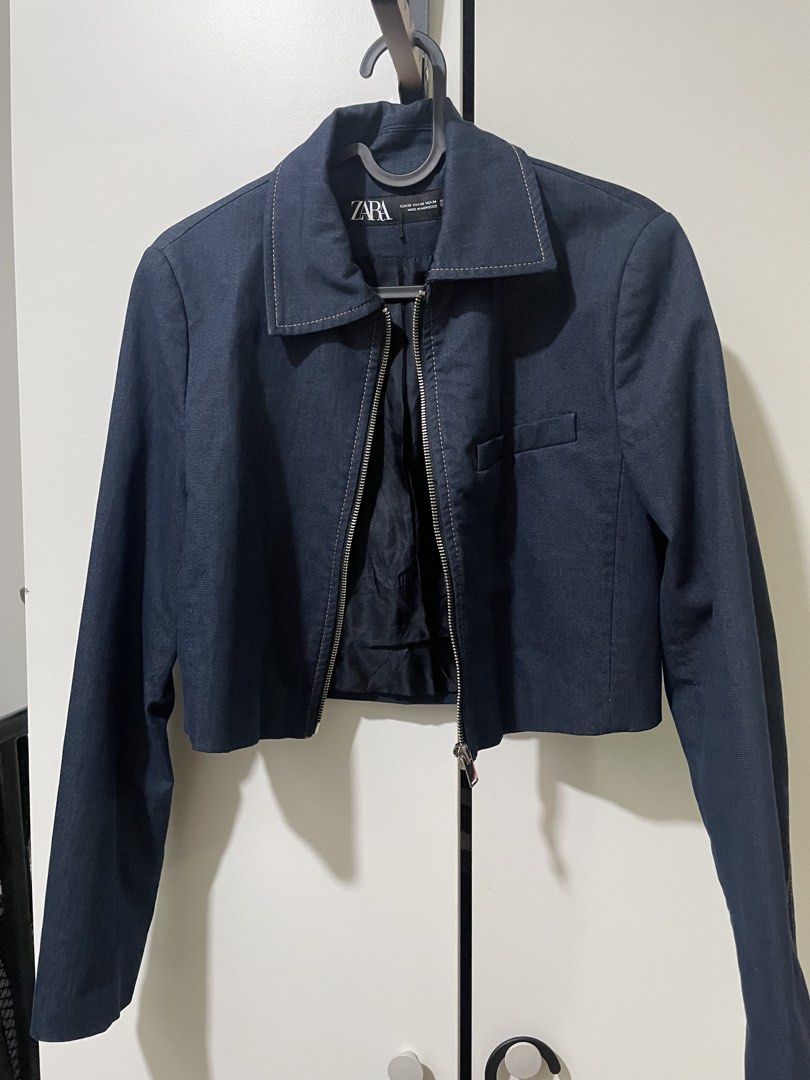 Zara Dark Blue Cropped Zip Jacket Size XS (Category: Coats, Jackets and Outerwear) located in Quezon City. Submitted by elliefruit (Listing ID 1467773543, Image 1). Description: - Brand/Model: Zara dark blue cropped jacket - Size: XS (short, waist-length fit) - Details: Full front zipper, pointed collar, single left chest pocket - Versatility: Great layering piece for daily wear and casual outings.