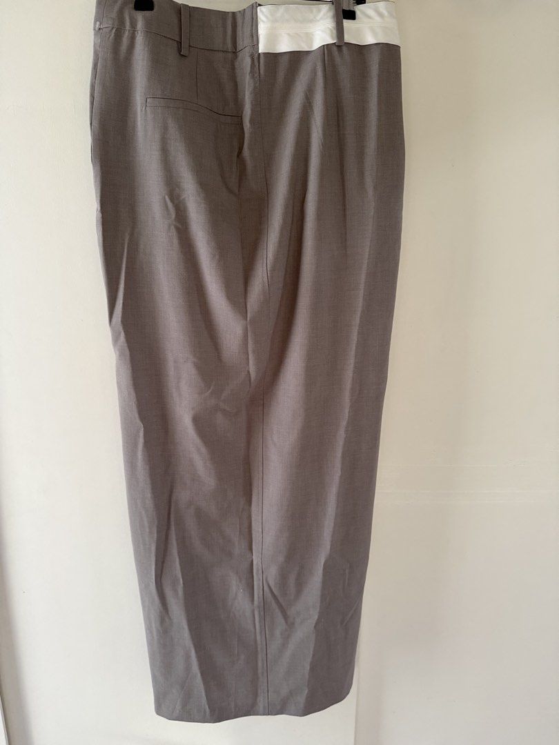 ZARA Grey Asymmetrical Skirt (Category: Skirts) located in Quezon City. Submitted by closetreset.qc (Listing ID 1467692912, Image 3). Description: • No when worn • No flaws • Small on tag but can fit up to 32” waist, length is 40” • + Sf.