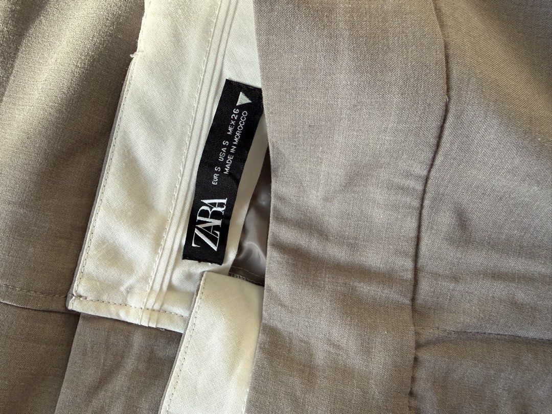ZARA Grey Asymmetrical Skirt (Category: Skirts) located in Quezon City. Submitted by closetreset.qc (Listing ID 1467692912, Image 2). Description: • No when worn • No flaws • Small on tag but can fit up to 32” waist, length is 40” • + Sf.