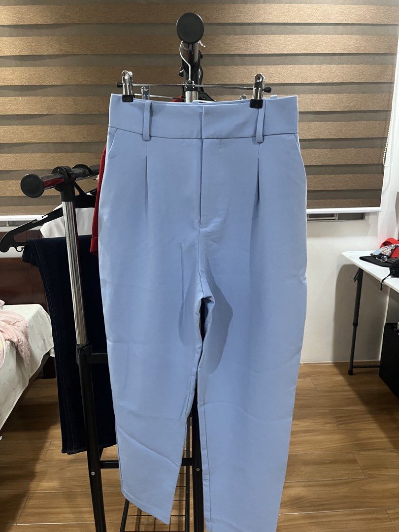 Zara Light Blue Trousers Size M EUR (Category: Jeans) located in Makati City. Submitted by grizzlybear95 (Listing ID 1467730192, Image 1). Description: Light blue trousers from Zara. Size M / USA M / MEX 28. High-waisted style with front pleats, belt loops, and side pockets. Clean back pockets detail. Made in Cambodia. Clean fabric, great staple piece for daily outfits or workwear. Easy to match with blouses and shirts..