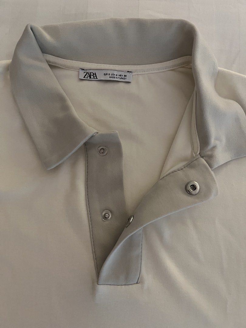Zara Men’s Shirt (Category: Tshirts & Polo Shirts ) located in Quezon City. Submitted by inthefrow (Listing ID 1467700649, Image 2). Description: - Preloved - Accent: Grey collar - Loose, relaxed fit, snap buttons - For work or play • Best price already .