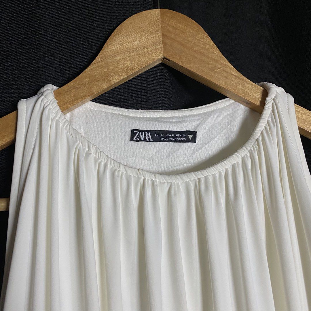 Zara Mini Balloon Dress White (Category: Dresses) located in Manila. Submitted by curatedvg. (Listing ID 1467746371, Image 3). Description: Width: Free Length: 31 inches Waist: 17 inches (unstretched) Size M / Medium Good condition Inside and outside stain (pink, blue) No pinholes.