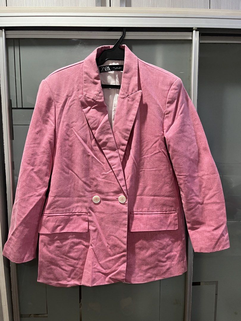 Zara Pink Double-Breasted Blazer Linen Size S (Category: Coats, Jackets and Outerwear) located in Makati City. Submitted by grizzlybear95 (Listing ID 1467729604, Image 1). Description: - Brand: Zara - Color: Pink with white inner lining - Size: Small (S) - Closure: Double-breasted front with two white buttons - Design: Structured lapel collar and two front flap pockets - Origin: Made in Cambodia - Condition: Excellent, ready to wear.