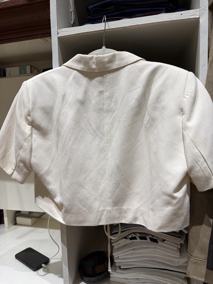 Zara Short Sleeve Crop Blazer White Size M (Category: Coats, Jackets and Outerwear) located in Batangas. Submitted by luxuryinmyclowset (Listing ID 1467700480, Image 3). Description: - Brand/Model: Zara crop blazer - Color: Cream white - Size: Medium (M) - Details: Short sleeves, lapel collar, front tie closure - Material: Lightweight fabric - Origin: Made in China - brandnew without tag .