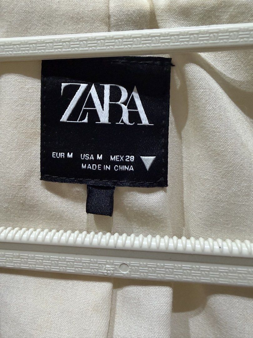 Zara Short Sleeve Crop Blazer White Size M (Category: Coats, Jackets and Outerwear) located in Batangas. Submitted by luxuryinmyclowset (Listing ID 1467700480, Image 2). Description: - Brand/Model: Zara crop blazer - Color: Cream white - Size: Medium (M) - Details: Short sleeves, lapel collar, front tie closure - Material: Lightweight fabric - Origin: Made in China - brandnew without tag .