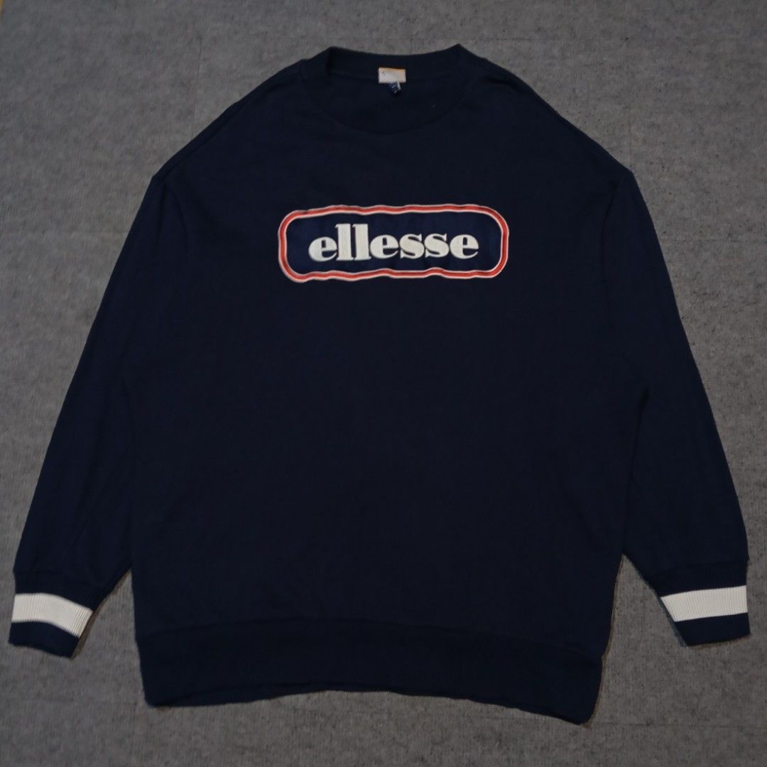 00's Ellesse Crewneck Sweatshirt (Category: Coats, Jackets and Outerwear) located in Taguig. Submitted by sito. (Listing ID 1467863080, Image 1). Description: For sale! 📣 00's Ellesse Crewneck Sweatshirt Specs and measurements: • Size Large • Length 34 inches • Width 27 inches • Sleeve Length 24 Condition Details: • Good Condition • Embroid Logo • No issue • Color rate: 10/10 • Overall Condition: 10/10 Price: ~ ₱581 Transaction Details: Location