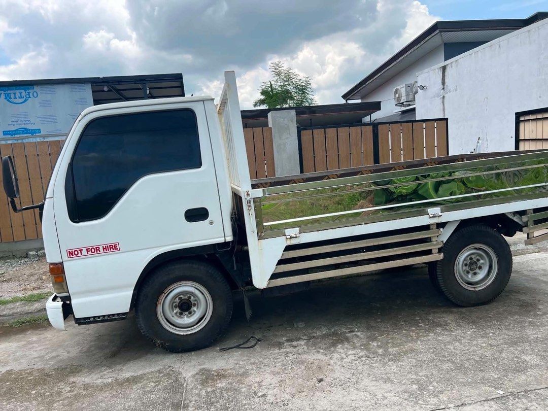 1995 Isuzu DROP SIDE TRUCK 10FT (Category: Heavy Vehicles) located in Angeles City. Submitted by nutella_crepe_2026 (Listing ID 1467903310, Image 2). Description: For sale: ISUZU DROP SIDE TRUCK 10FT 1995 -newly built stainless body -new battery -aftermarket aircon (working) -makapal gulong -plastic covered seats -speedometer (not working) -gas gauge (working) -aftermarket temperature -bring your trusted mechanic -automatic window .
