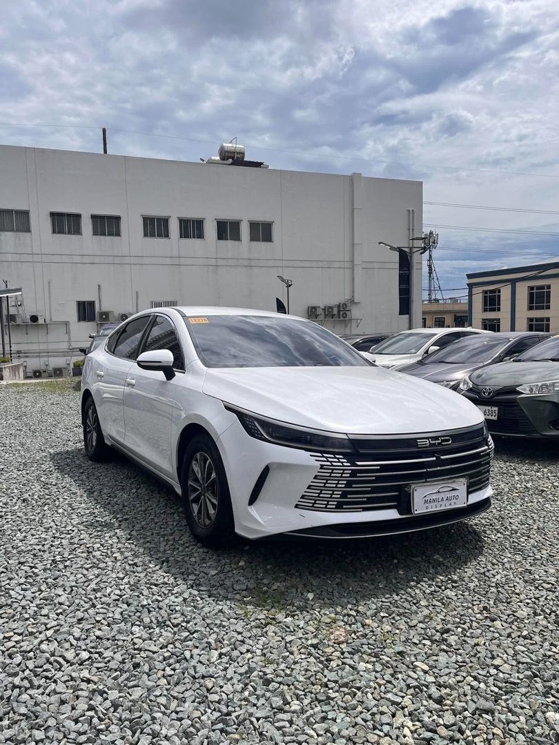2025 BYD SEAL 5 DYNAMIC (Category: Used Cars) located in Pasig City. Submitted by mad_cars (Listing ID 1467849903, Image 2). Description: 2025 BYD SEAL 5 DYNAMIC GAS HYBRID AUTOMATIC TRANSMISSION (AVAILABLE FOR FINANCING ZERO PERCENT PROCESSING FEE UNTIL OCTOBER 16-17 ONLY.) ₱798,000 Keyless White 9tkms mileage 2 ending plate Gas-Hyrbid Price ₱798,000 Down Payment ₱278,502 Loan Financed ₱558,600 Monthly · 1 Year ₱53,533 Monthly · 2 Years ₱30,258 