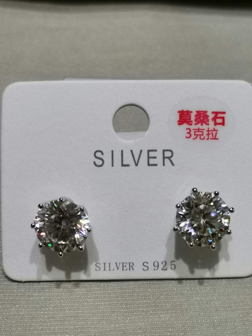 3CME5 3-CARAT MOISSANITE STUD Sterling Silver EARRING (Category: Earrings) located in Cavite. Submitted by falconsclawset (Listing ID 1467918607, Image 1). Description: - Brand new, never worn moissanite stud earrings - Brilliant round cut stones with stated 3 carats total/per stone weight - S925 sterling silver settings (marked on backing card) - Secure six-prong mountings for daily wear - Comes attached to the original store display card.