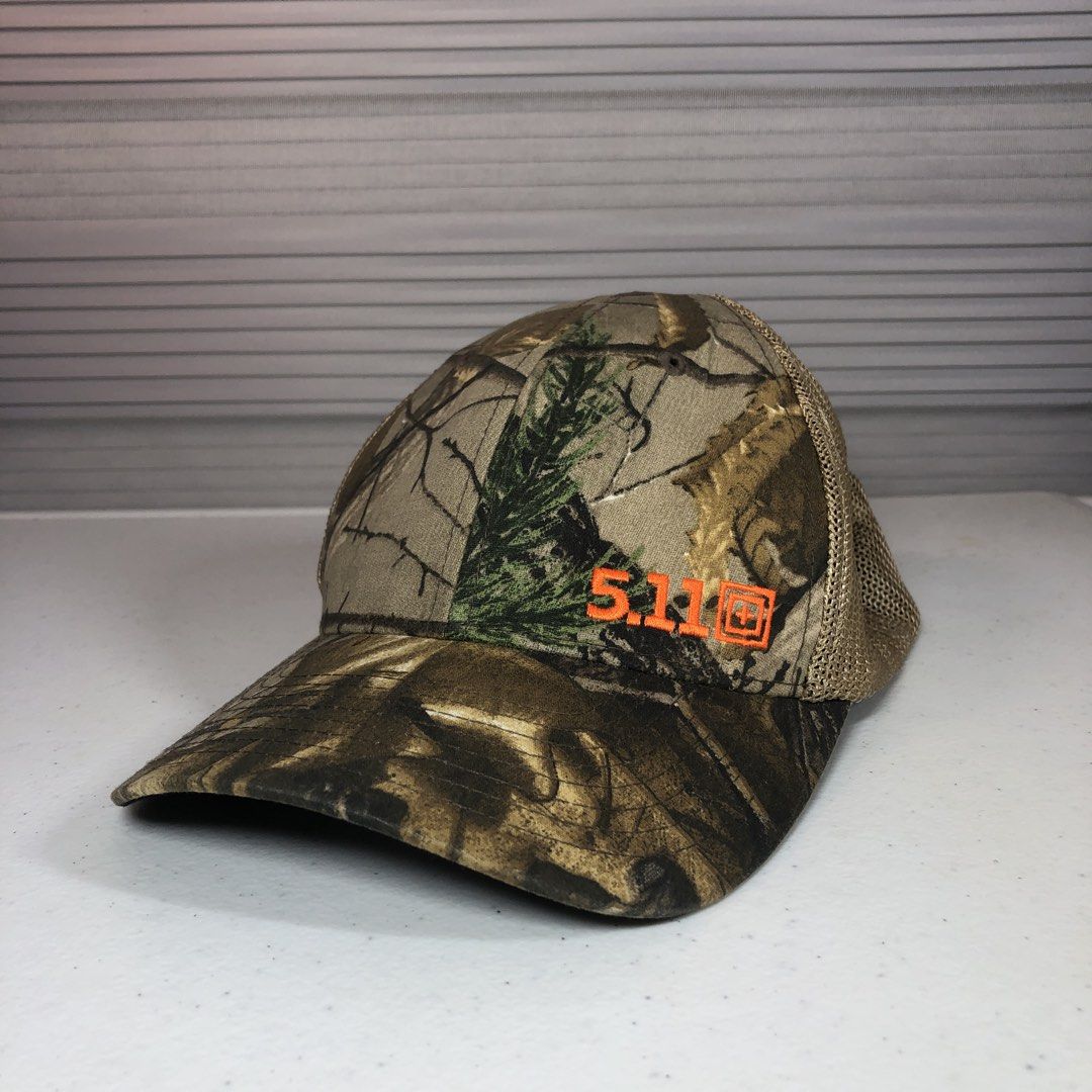 5.11 Tactical Flexfit Realtree Mesh Back Cap (Category: Caps & Hats) located in Manila. Submitted by all.dressed.up (Listing ID 1467849858, Image 1). Description: Brand: 5.11 Tactical Series Design: Camo front panels/brim with tan mesh back and striking orange embroidered logo Size: L/XL (Flexfit internal stretch band for a secure fit) Material: Polyester, cotton, and spandex blend Care: Hand wash only Spandex feels a little loose but unnoticeabl