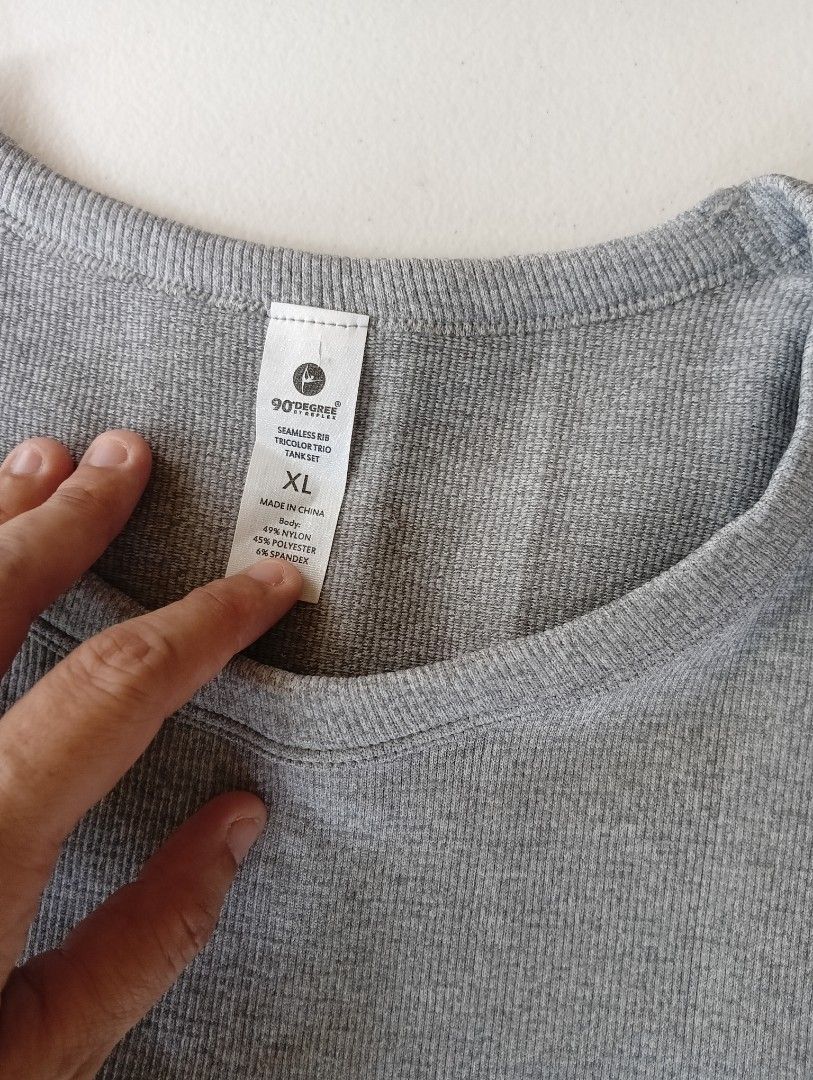 90 Degrees Cropped Tank Top (Category: Activewear) located in Rizal. Submitted by timeless_shop (Listing ID 1467841494, Image 2). Description: 90 DEGREES BY REFLEX Seamless Cropped Tank - Gray ** Isang beses ko nasuot** 📏 XL on tag - Fits Medium- Large Bust Fit 34-36 🏷️ Details: - 45% Nylon / 49% Poly / 6% Spandex - Stretchy fabric ✨ Condition: 9.9/10 Like New at 2 beses ko lang nasuot. 🎨 Color rate 9.9/10 Heather Gray 📍 Location: Rizal 💳 Pa