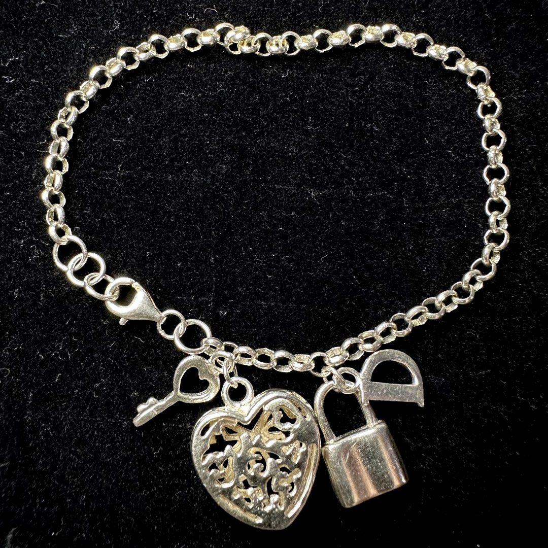 925 silver dior inspired charm bracelet 8.8g (Category: Bracelets) located in Pakil. Submitted by primrosehearts (Listing ID 1467916045, Image 1). Description: authentic 925 italy silver with stamping hypoallergenic grams: 8.8g.