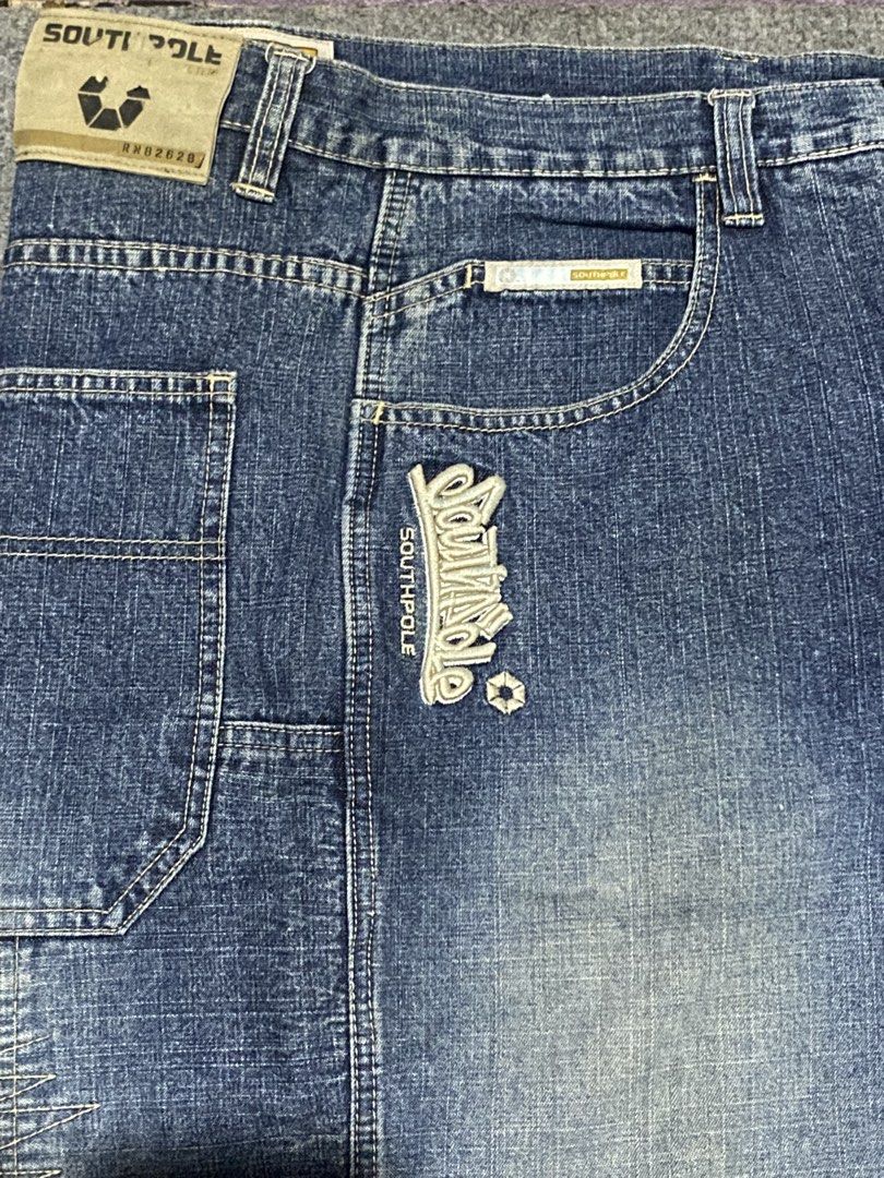 🔥 Authentic Vintage Southpole Baggy Patchwork Denim Jeans - (Category: Jeans) located in Tapaz. Submitted by espoting (Listing ID 1467979643, Image 3). Description: Letting go of this absolute grail—an authentic vintage Southpole Baggy Denim Jeans from the peak Y2K era. Features a heavy, multi-shade patchwork panel construction across the front and back with intentional zig-zag raw edge stitching. Detailed with a massive, high-density embroidere