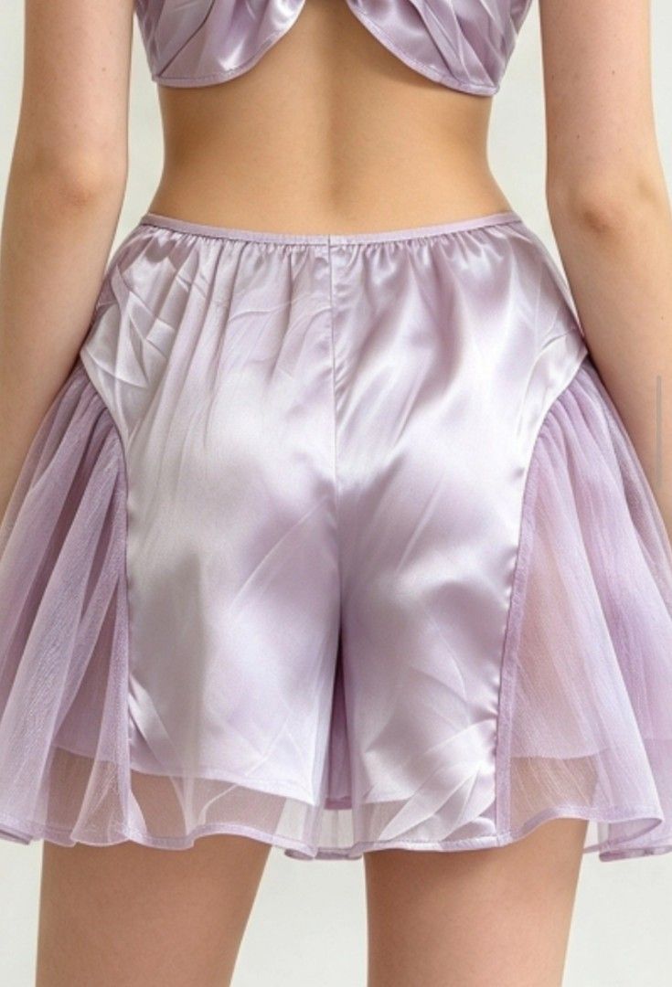 💜 Lavender Satin Bow Cut-Out Terno Set (Category: Undergarments & Loungewear) located in Kalibo. Submitted by cloth.ly (Listing ID 1467856423, Image 2). Description: Measurements: • Bust: = 30" • Waist: 24" — stretchy fit • Hips: = 44" • Skirt Length: 12" • Adjustable spaghetti straps Details: • Sweetheart neckline with big bow detail 🎀 • Unique cut-out design — dainty & feminine ☁️ • Silky satin fabric + tulle overlay on skirt • Matching bow a