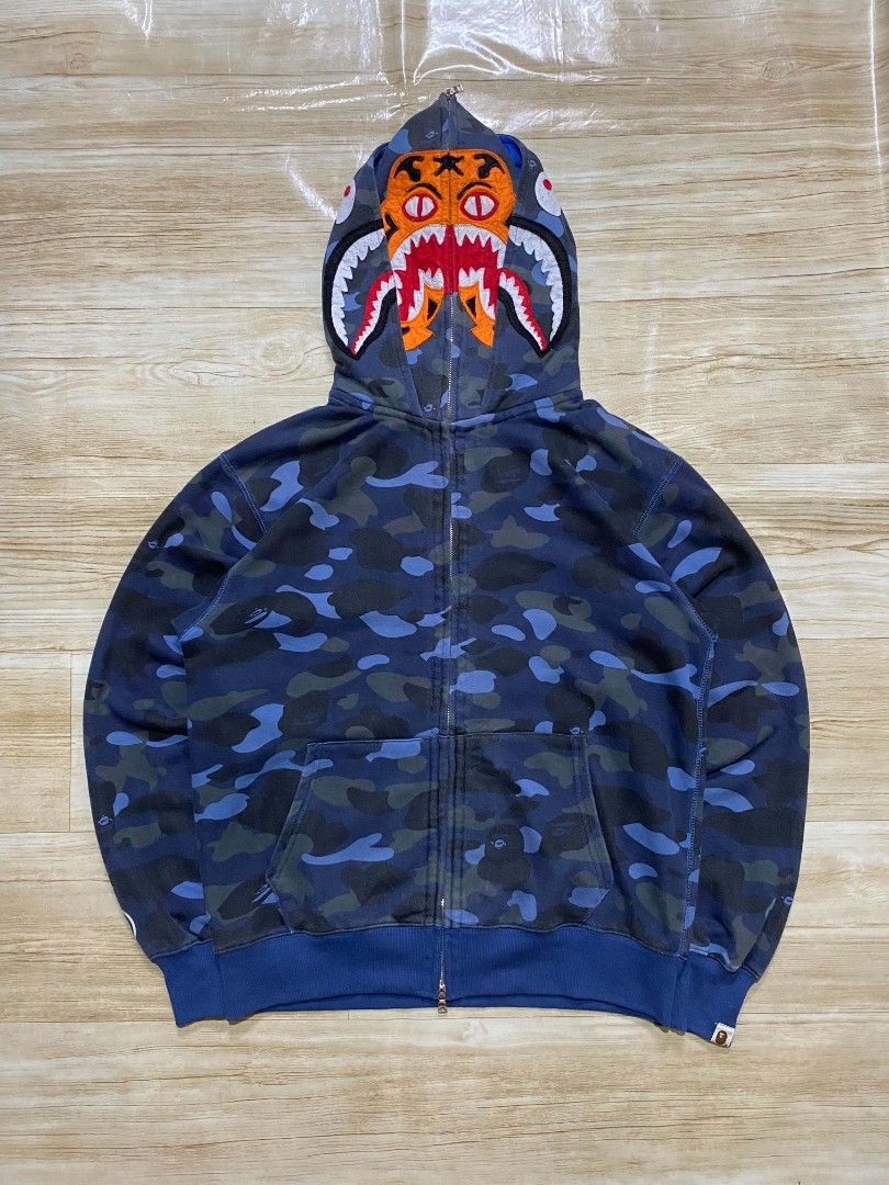A Bathing Ape by Bape Shark Tiger Full zip (Category: Hoodies) located in Manila. Submitted by jihan.nunez_8 (Listing ID 1467868243, Image 2). Description: Size Xl W23.5 L27 no issue as new.