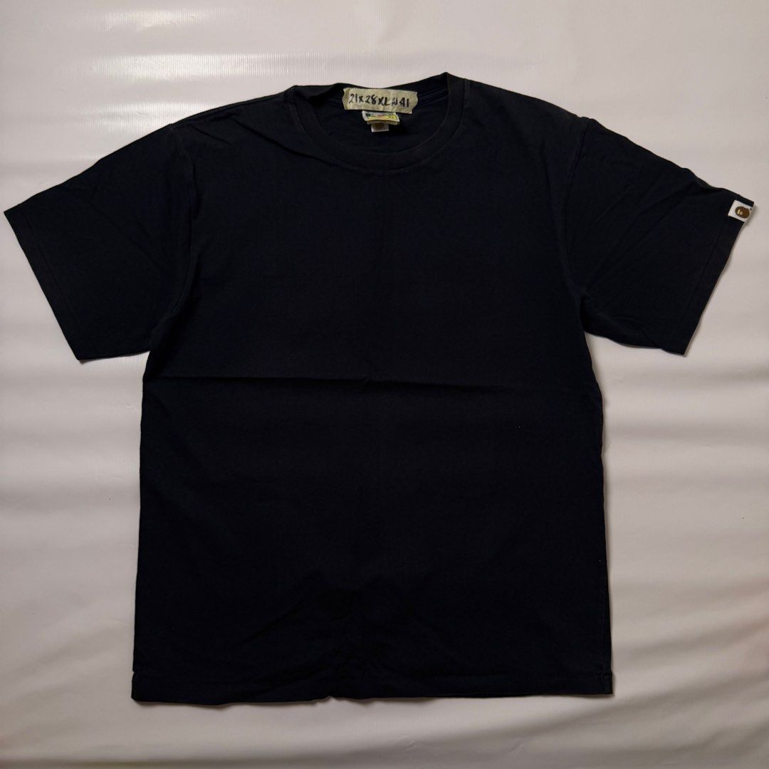 A Bathing Ape World Gone Mad Tee Black XL (Category: Tshirts & Polo Shirts ) located in Gapan. Submitted by rasthriftshop17 (Listing ID 1468007280, Image 2). Description: BAPE w/back hit Size on tag: XL Dimes: 21 x 28 ₱950 + sf Condition: Excellent Color rate: 9/10 Issue: None.