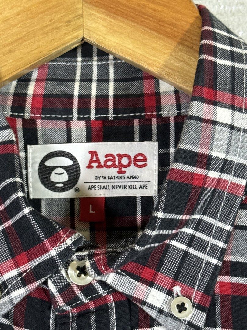 Aape button up ahirt (Category: Tshirts & Polo Shirts ) located in Quezon City. Submitted by dailyfits08 (Listing ID 1468018527, Image 3). Description: Aape button down Size large 21.5x26 Excellent.