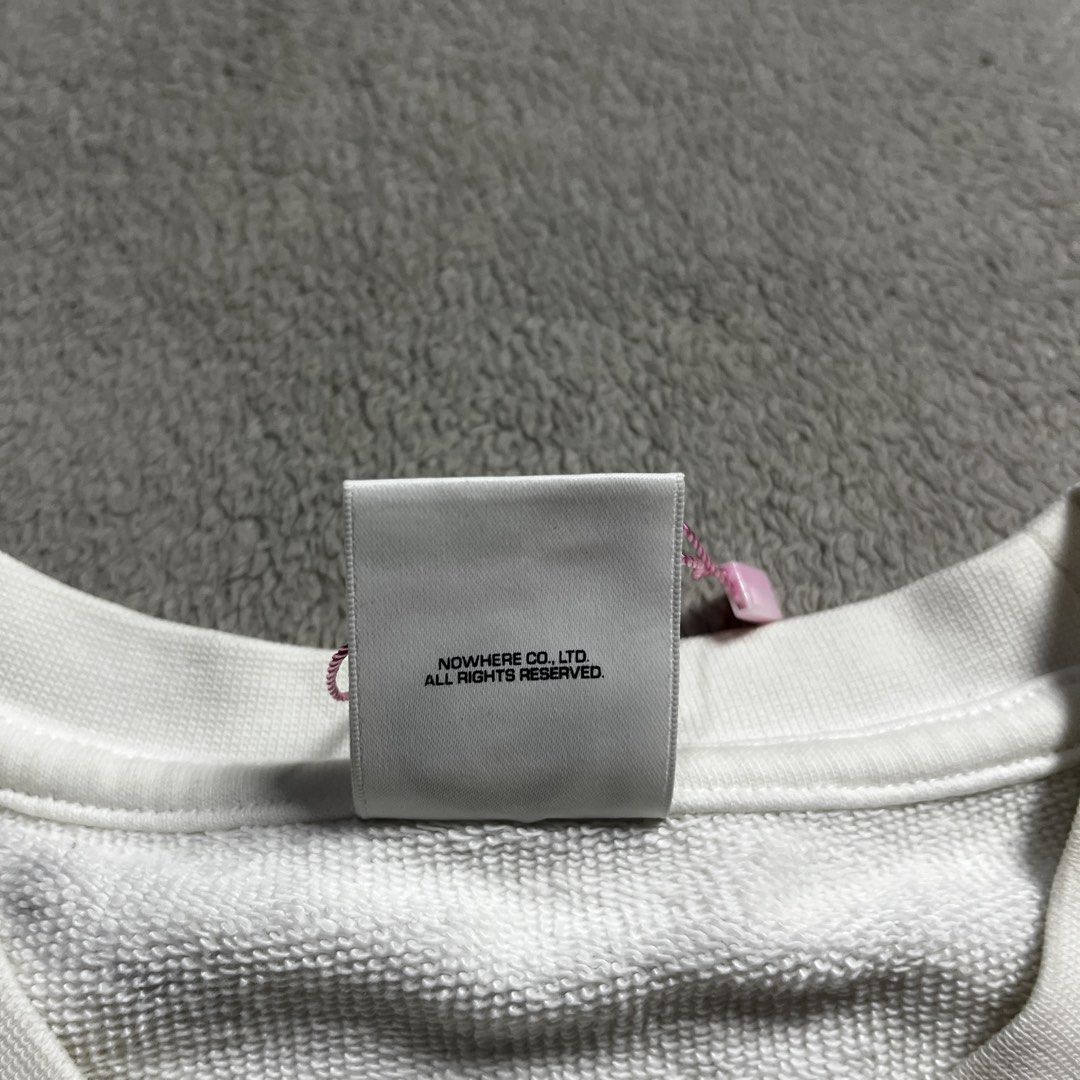 AAPE NOW White Sweatshirt Size M (Category: Coats, Jackets and Outerwear) located in Manila. Submitted by thrifted4life (Listing ID 1467983618, Image 3). Description: AAPE BY *A BATHING APE® crewneck Size M - W:21.5 L:26 Excellent Condition 9.5/10 Light stain .