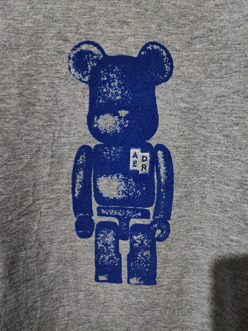 ADER ERROR X BE@RBRICK TEE (Category: Tshirts & Polo Shirts ) located in Iloilo. Submitted by gooddimes (Listing ID 1468038642, Image 3). Description: Ader Error X Be@rbrick Logo Tee Authentic Size on tag: A1 Dimes: 21Wx27L Issue/s: No major flaws other than natural sign of usage Color rate: 9.8/10 Excellent condition ₱2,000 Reminders: - All items are thrifted, please manage your expectations - Color may vary due to lighting - Please wash before 