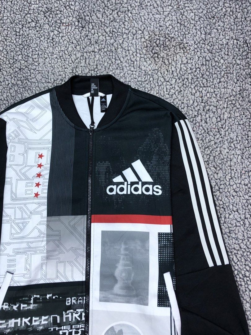 Adidas All Over Print Bommer Jacket (Category: Hoodies) located in Tayabas. Submitted by retro.rags69 (Listing ID 1467846072, Image 2). Description: Adidas All Over Print Bommer Jacket • Excellent condition • Color rate: 9.5/10 • width: 22 • length: 27 • No Issue • Lacer Print Logo Design • All Over Print Colorway • Big Logo Design • Best Fit: M-Semi L.