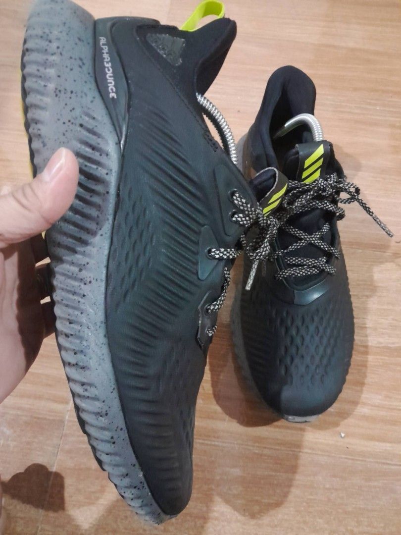 Adidas Alphabounce Black Grey Running Shoes (Category: Sneakers) located in Calamba. Submitted by ysabellascloset17 (Listing ID 1468017239, Image 1). Description: - Model: Adidas Alphabounce running shoes - Color: Black and grey with a stylish speckled midsole and lime green accents - Outsole: Continental rubber for high traction and durability - Condition: Lightly worn a few times, soles show minimal dirt, and plenty of grip left - Best for: Dai