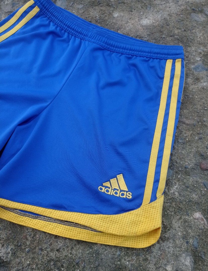 Adidas athletic shorts yellow three-stripe side (Category: Activewear) located in Guiguinto. Submitted by selected_3rp (Listing ID 1468025499, Image 3). Description: Adidas athletic shorts yellow three-stripe side accents, yellow hem piping, and an embroidered Adidas logo. size large no issue pm.